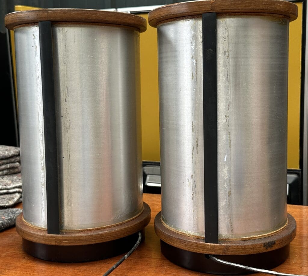 THB12682 Jim Rogers JR model 149 loudspeaker cylindrical teak and stainless  steel with diamond mesh speaker covers (1978) pair • Trevor Howsam Limited  (Boston)